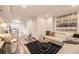 View of finished basement showing flexible living and dining space at 6102 S Owens Ct, Littleton, CO 80127