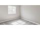 Bedroom with a neutral color scheme and plush carpet with a bright window at 1566 S Richfield Way, Aurora, CO 80017