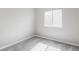 Bedroom features a neutral color scheme, plush carpet, and bright natural light at 1566 S Richfield Way, Aurora, CO 80017