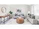 Inviting living room featuring stylish furniture, area rug, and decor at 1566 S Richfield Way, Aurora, CO 80017
