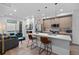 Bright and open floor plan with modern kitchen, living room, and fireplace at 1930 Hooker St # 3, Denver, CO 80204