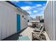 Inviting rooftop deck with outdoor seating, a grill, and picturesque views at 1930 Hooker St # 3, Denver, CO 80204