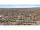 Expansive neighborhood with mature trees, and a large lake set against a mountain backdrop at 3540 Vrain St, Denver, CO 80212