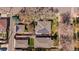 An aerial view of a home shows solar panels on the roof and a well-maintained backyard at 3540 Vrain St, Denver, CO 80212