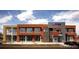 Commercial building with multi-colored brick exterior and well-maintained facade at 3540 Vrain St, Denver, CO 80212