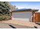 Detached garage with solar panels on the roof, providing sustainable energy at 3540 Vrain St, Denver, CO 80212