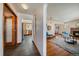 Bright hallway showcasing seamless transition to living room and modern kitchen at 3540 Vrain St, Denver, CO 80212