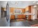 Well-lit kitchen features modern appliances, custom cabinets, and a functional layout at 3540 Vrain St, Denver, CO 80212