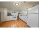 Efficient kitchen with ample cabinetry, and modern appliances providing a practical cooking space at 3540 Vrain St, Denver, CO 80212