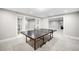 Finished basement recreation area with ping pong table at 869 Vine St, Denver, CO 80206