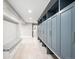 Spacious basement storage with built-in cabinets and bench at 869 Vine St, Denver, CO 80206