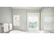 Spa-like bathroom with soaking tub, shower, and window at 869 Vine St, Denver, CO 80206
