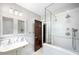 Updated bathroom with double vanity and large shower at 869 Vine St, Denver, CO 80206