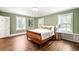 Spacious bedroom with hardwood floors and ample natural light at 869 Vine St, Denver, CO 80206