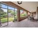 Covered brick patio with seating area and garden views at 869 Vine St, Denver, CO 80206