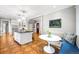 Eat-in kitchen with breakfast nook and access to other rooms at 869 Vine St, Denver, CO 80206