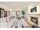 Spacious living room with fireplace and large windows at 869 Vine St, Denver, CO 80206