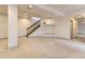 Open basement area features stairs, carpet, and recessed lighting at 1562 Suncrest Rd, Castle Rock, CO 80104
