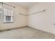 Neutral bedroom with a window bringing in natural light, and carpeted flooring at 1562 Suncrest Rd, Castle Rock, CO 80104