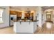 Well-equipped kitchen with stainless steel appliances and a central island with bar seating at 1562 Suncrest Rd, Castle Rock, CO 80104