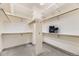Bright walk-in closet with ample shelving and hanging space, providing organized storage at 1562 Suncrest Rd, Castle Rock, CO 80104