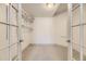 Walk-in closet with wire rack shelving, carpet flooring, and ample storage potential at 1562 Suncrest Rd, Castle Rock, CO 80104