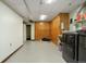 The basement includes a utility area with modern washer and dryer units plus added storage at 6371 Brooks Dr, Arvada, CO 80004