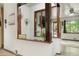 Open Living Room featuring a wooden pass through to the updated kitchen at 6371 Brooks Dr, Arvada, CO 80004