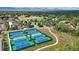 Aerial view of community tennis courts offering residents an active and engaging outdoor recreational opportunity at 6371 Brooks Dr, Arvada, CO 80004