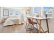 Bright bedroom with a dedicated desk area and plenty of natural light from multiple windows at 3550 W 63Rd Ave, Denver, CO 80221