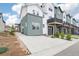 Attractive exterior of a modern home featuring a spacious driveway and well-maintained landscaping in a desirable neighborhood at 3550 W 63Rd Ave, Denver, CO 80221