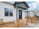 Charming home exterior with a cozy front porch and well-kept landscaping at 3550 W 63Rd Ave, Denver, CO 80221