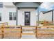 Charming home exterior with a cozy front porch and inviting entryway at 3550 W 63Rd Ave, Denver, CO 80221