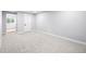 Finished basement area featuring neutral carpet and plenty of room for activities at 2484 E 101St Ct, Thornton, CO 80229