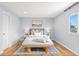 Cozy bedroom featuring neutral decor and soft textures, creating a peaceful retreat at 2484 E 101St Ct, Thornton, CO 80229