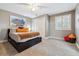 Cozy bedroom with gray walls, carpet, ceiling fan, modern art, and closet at 6269 S Coventry E Ln, Littleton, CO 80123