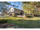 Two-story home with attached garage and landscaped yard at 6269 S Coventry E Ln, Littleton, CO 80123