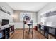 Bright home office with modern desk and shelving at 6269 S Coventry E Ln, Littleton, CO 80123