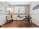 Cozy home office with wainscoting, a bright window, and modern decor at 6269 S Coventry E Ln, Littleton, CO 80123