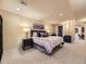 Basement bedroom boasting plush carpet, recessed lighting, desk, and walk-in closet access at 6194 E Briarwood Cir, Centennial, CO 80112