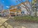 Home exterior view of two story deck with beautiful backyard at 6194 E Briarwood Cir, Centennial, CO 80112