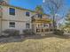 View of home exterior featuring two story deck and patio at 6194 E Briarwood Cir, Centennial, CO 80112