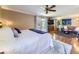 Large main bedroom with ensuite bathroom, sitting area, and private balcony at 6194 E Briarwood Cir, Centennial, CO 80112