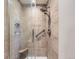 Modern shower featuring a tiled surround, and seating at 6194 E Briarwood Cir, Centennial, CO 80112