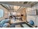 Expansive basement gym area with workout equipment and open ceiling, ready for customization at 5392 Sanctuary Ave, Firestone, CO 80504