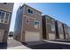 Modern townhome featuring a neutral color palette, a two-car garage, and great natural light at 15858 E Broncos Pl, Englewood, CO 80112