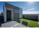 This rooftop deck with turf is perfect for entertaining or enjoying a quiet moment, offering neighborhood views at 15858 E Broncos Pl, Englewood, CO 80112