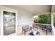 Inviting front porch with seating area to enjoy outdoors at 2160 Ance St, Strasburg, CO 80136