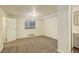 Finished basement space with new carpet flooring and access to the utilities at 9105 Oberon Rd # 2, Arvada, CO 80004