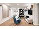 Finished basement featuring a ping pong table and living area at 10069 E 28Th Ave, Denver, CO 80238